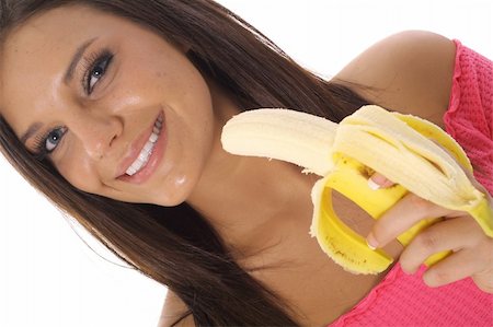pretty women eating banana - model banana angle Photographie de stock - Aubaine LD & Abonnement, Code: 400-04509092