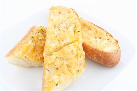 pane all'aglio - fresh and oven baked garlic bread Fotografie stock - Microstock e Abbonamento, Codice: 400-04509147