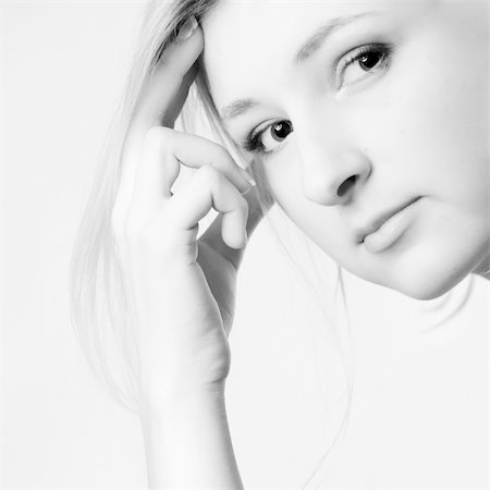 simsearch:400-05041629,k - Young girl in a dress in the studio on a white background. Fotografie stock - Microstock e Abbonamento, Codice: 400-04509446