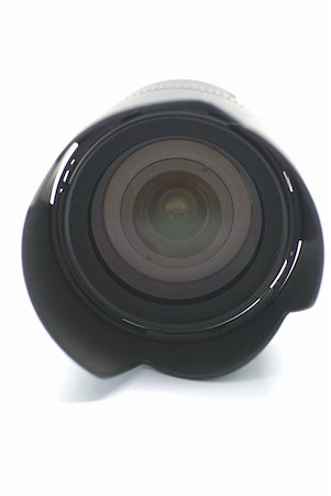 simsearch:400-04564986,k - Zoom camera lens reflected on the white background Photographie de stock - Aubaine LD & Abonnement, Code: 400-04509456