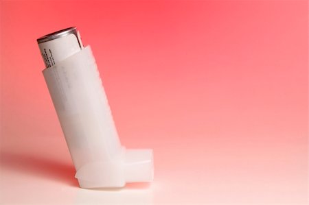 A medicated inhaler used for asthma attacks. Stock Photo - Budget Royalty-Free & Subscription, Code: 400-04509846