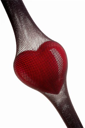 pantyhose pulling - Red heart inside of the stretched stocking in a grid Stock Photo - Budget Royalty-Free & Subscription, Code: 400-04500193