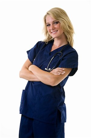simsearch:400-03995908,k - Young pretty blond woman healthcare worker wearing blue scrubs and a stethoscope standing on white Stock Photo - Budget Royalty-Free & Subscription, Code: 400-04500276