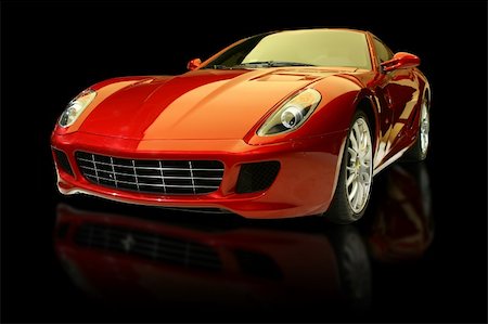 simsearch:400-09095003,k - Red luxury sports car against a black background and with reflection. Stockbilder - Microstock & Abonnement, Bildnummer: 400-04500927