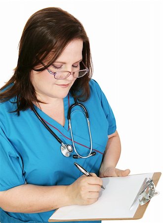 Nurse in scrubs taking notes.  Page left blank for your text.  Isolated on white. Stock Photo - Budget Royalty-Free & Subscription, Code: 400-04501025