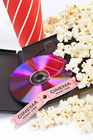 DVD, popcorn with soda and two cinema tickets on white background Stock Photo - Budget Royalty-Free & Subscription, Code: 400-04501128