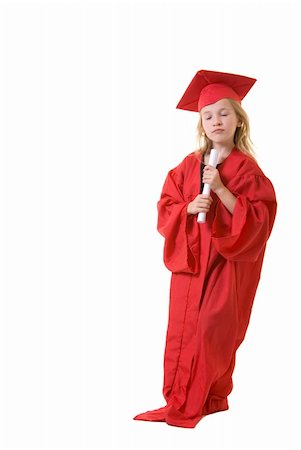 photos of little girl praying - Cute little eight year old wearing red graduation cap and gown holding a diploma with eyes close and serious praying expression on white Stock Photo - Budget Royalty-Free & Subscription, Code: 400-04501165