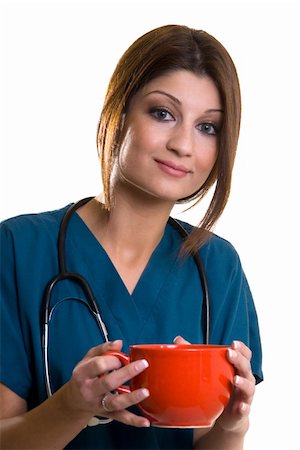 doctors coffee - Attractive brunette young woman nurse holding a huge red coffee mug on white Stock Photo - Budget Royalty-Free & Subscription, Code: 400-04501209