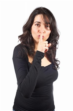sad and quiet woman - Casual woman making a gesture to be silence over a white background Stock Photo - Budget Royalty-Free & Subscription, Code: 400-04501300