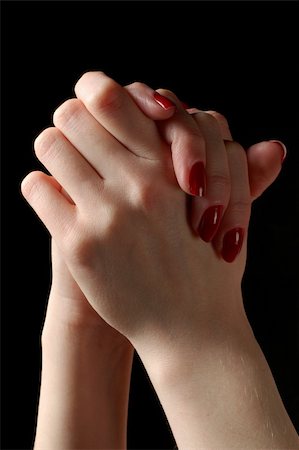 simsearch:400-04178541,k - photo of hands in praying pose, isolated on black Photographie de stock - Aubaine LD & Abonnement, Code: 400-04501660