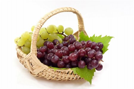 Red and Green grapes in a Basket on a bright background Stock Photo - Budget Royalty-Free & Subscription, Code: 400-04501780