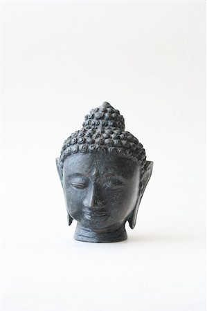 Head of Buddha with a expression of calm and serenity Stock Photo - Budget Royalty-Free & Subscription, Code: 400-04501959