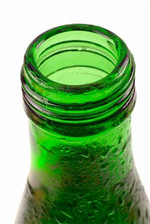 fresh spring drinking water - bottled water in green, condensation-covered bottle; differential focus Stock Photo - Budget Royalty-Free & Subscription, Code: 400-04501961