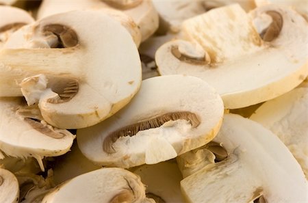 simsearch:400-07217319,k - Close-up of fresh champignon slices on isolated background Stock Photo - Budget Royalty-Free & Subscription, Code: 400-04502127