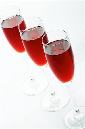 simsearch:400-05286682,k - Three high and beautiful glasses with red wine Stock Photo - Budget Royalty-Free & Subscription, Code: 400-04503143
