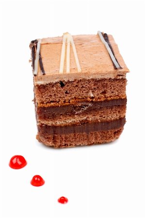 simsearch:400-04574251,k - Delicious chocolate cake with soft shadow on white dish. Shallow DOF Photographie de stock - Aubaine LD & Abonnement, Code: 400-04503204