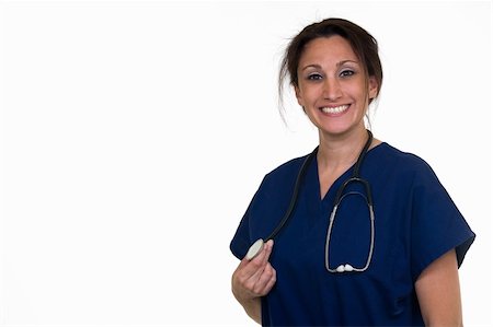 simsearch:400-03995908,k - Confident woman healthcare worker wearing dark blue scrubs holding the end of a stethoscope on white Stock Photo - Budget Royalty-Free & Subscription, Code: 400-04503261