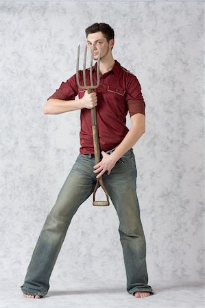 simsearch:400-03995127,k - Male model in red shirt and blue jeans Stock Photo - Budget Royalty-Free & Subscription, Code: 400-04503494