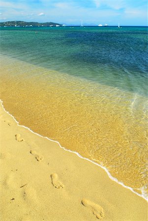 Footprints on the golden sand of Pampelonne beach near St. Tropez in French Riviera Stock Photo - Budget Royalty-Free & Subscription, Code: 400-04514067