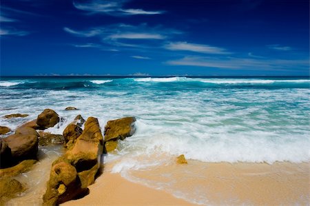 simsearch:400-04783475,k - Waves crashing on rocks at beautiful secluded Australian beach Foto de stock - Royalty-Free Super Valor e Assinatura, Número: 400-04514293