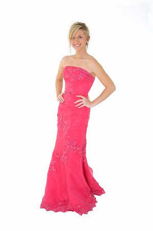 Caucasian teenager wearing a prom bress standing on a white background Stock Photo - Budget Royalty-Free & Subscription, Code: 400-04514366