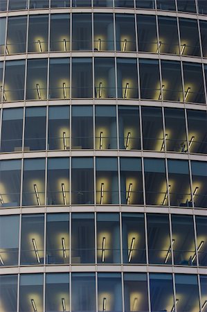 simsearch:400-04306363,k - Illuminated windows of corporate office building. Photographie de stock - Aubaine LD & Abonnement, Code: 400-04514375