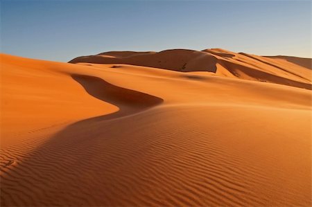 rissani - Desert in Hasi Labied, Moroco, Africa. Interesting colored sand dunes. Popular travel destination. Stock Photo - Budget Royalty-Free & Subscription, Code: 400-04514472