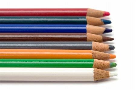 simsearch:693-03300516,k - A row of colored pencils shot against a white background. Photographie de stock - Aubaine LD & Abonnement, Code: 400-04514950
