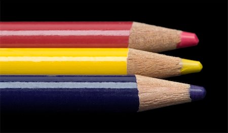 simsearch:400-07614613,k - A row of colored pencils shot against a black background. Includes clipping path. Photographie de stock - Aubaine LD & Abonnement, Code: 400-04514951