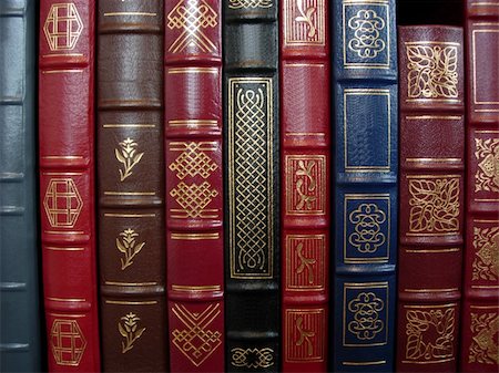 A row of books on a bookshelf Foto de stock - Super Valor sin royalties y Suscripción, Código: 400-04514972