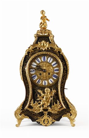 simsearch:700-00650072,k - An antique clock ornate with golden Cupids and floral motives. Photographie de stock - Aubaine LD & Abonnement, Code: 400-04515025