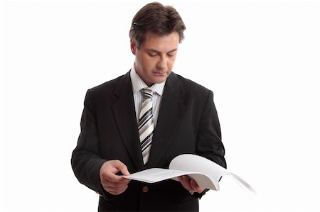 reports white background - Busienssman reading a report or other document. Stock Photo - Budget Royalty-Free & Subscription, Code: 400-04515151