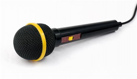 simsearch:400-04348398,k - Black microphone for singing isolated on white background Fotografie stock - Microstock e Abbonamento, Codice: 400-04515351