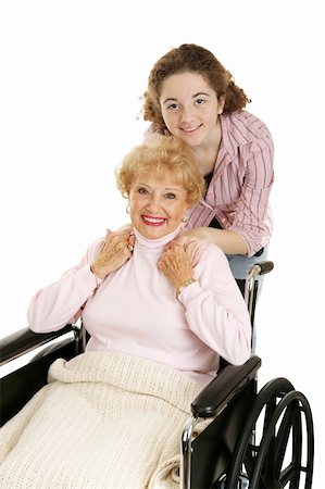 Teen girl with her disabled grandmother.  Isolated on white. Stock Photo - Budget Royalty-Free & Subscription, Code: 400-04515364