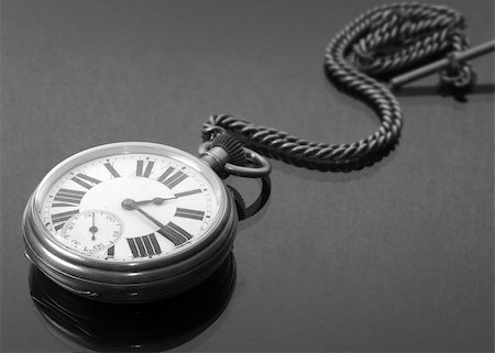 pocket watch - Vintage pocket watch with chain Stock Photo - Budget Royalty-Free & Subscription, Code: 400-04515695