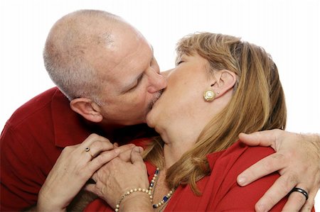 simsearch:400-04033107,k - Happy mature couple kissing passionately.  Isolated on white. Stock Photo - Budget Royalty-Free & Subscription, Code: 400-04517301
