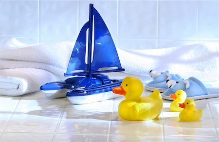Toys with white towels on bathroom floor Stock Photo - Budget Royalty-Free & Subscription, Code: 400-04518352