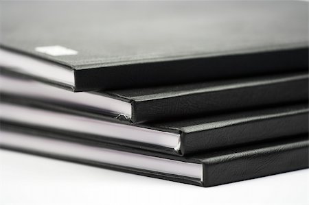 simsearch:400-05381119,k - Stack of black notebooks close up Stock Photo - Budget Royalty-Free & Subscription, Code: 400-04518787