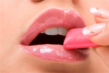 simsearch:400-05676902,k - clse up of a red mouth with lipstick and lip gloss Stock Photo - Budget Royalty-Free & Subscription, Code: 400-04518860