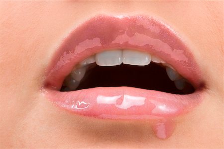 simsearch:400-05676902,k - clse up of a red mouth with lipstick and lip gloss dropping down Stock Photo - Budget Royalty-Free & Subscription, Code: 400-04518862