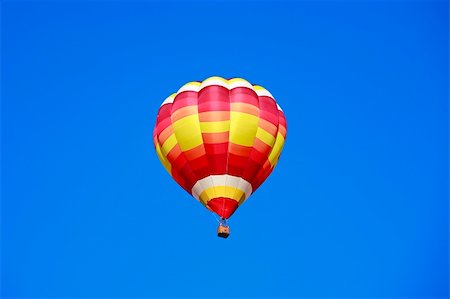 simsearch:400-08032526,k - Hot Air Balloon Isolated Against a Blue Sky Foto de stock - Super Valor sin royalties y Suscripción, Código: 400-04519006