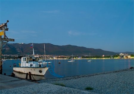 simsearch:700-00186828,k - fisherman's boat in the harbour in a small town on the beach. Night view Stock Photo - Budget Royalty-Free & Subscription, Code: 400-04519385