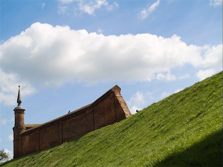 stone walls in meadows - Rustic brick wall on the top of hill Stock Photo - Budget Royalty-Free & Subscription, Code: 400-04519388