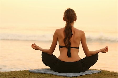yoga and breath exercises by the sunset Stock Photo - Budget Royalty-Free & Subscription, Code: 400-04519413