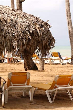simsearch:400-06947087,k - chaise longues and sunshade on the beach Stock Photo - Budget Royalty-Free & Subscription, Code: 400-04519994