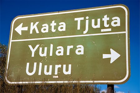 parque nacional kata tjuta - Road sign with direction to Kata Tjuta and Yulara Uluru in Uluru Kata Tjuta National Park, Australia. Foto de stock - Super Valor sin royalties y Suscripción, Código: 400-04510218