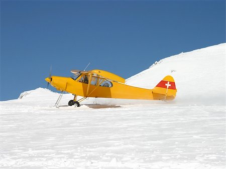 simsearch:400-03978690,k - A plane equipped with ski taking off from a glacier (Switzerland) Foto de stock - Super Valor sin royalties y Suscripción, Código: 400-04510263