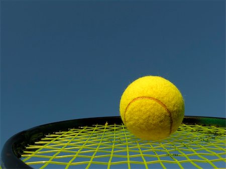 Tennis ball and tennis racket Stock Photo - Budget Royalty-Free & Subscription, Code: 400-04510677