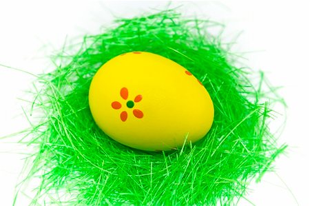 One yellow easter egg with green grass isolated on white Stock Photo - Budget Royalty-Free & Subscription, Code: 400-04511485