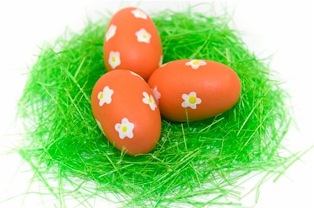 Three red easter eggs with green grass isolated on white Stock Photo - Budget Royalty-Free & Subscription, Code: 400-04511486